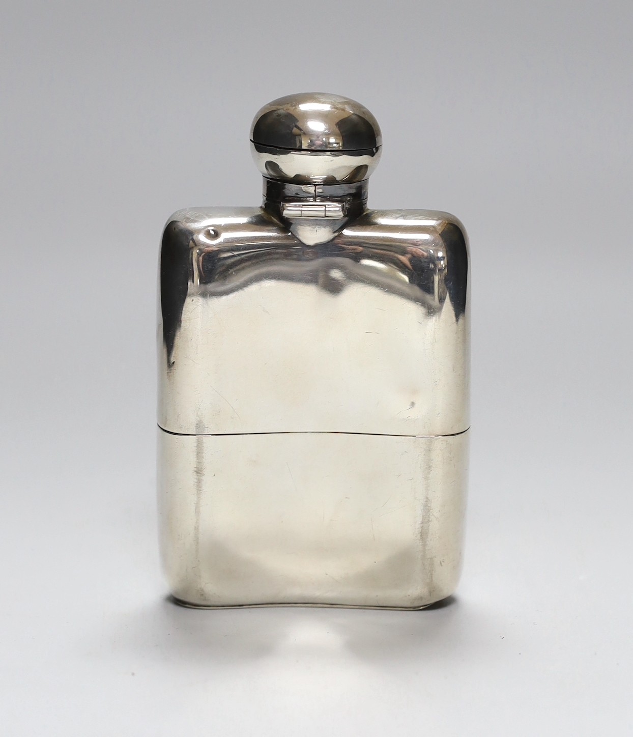 A late Victorian silver hip flask, engraved with later date and initials, William Neale & Sons, Chester, 1900, 12.1cm, gross 5.4oz.